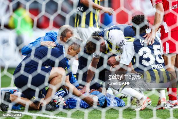 Pain at Fenerbahce goalkeeper Irfan Can Egribayat during the UEFA Conference League play-offs match between FC Twente and Fenerbahce SK at Stadion De...