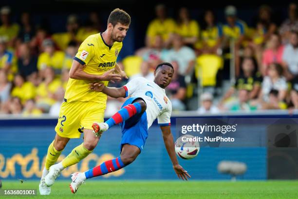 Matteo Gabbia centre-back of Villarreal and Italy and Ansu Fati left winger of Barcelona and Spain compete for the ball during the LaLiga EA Sports...