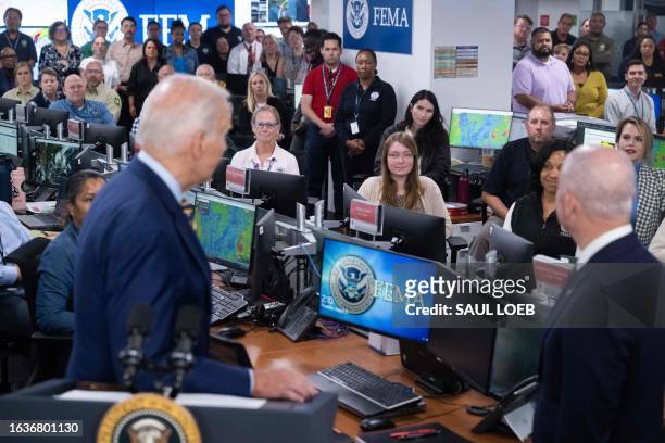 President Joe Biden visits the headquarters of the Federal Emergency Management Agency in Washington, DC, on August 31 to thank the team staffing the...