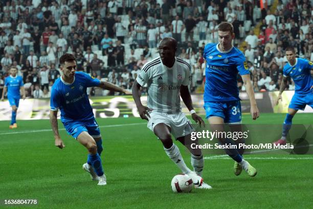 Vincent Aboubakar of Besiktas and Mykola Shaparenko , Oleksandr Syrota of Dynamo Kyiv battle for the ball during the UEFA Conference League Play off...