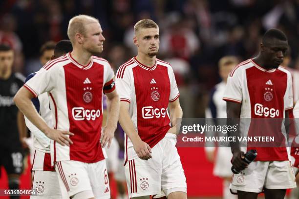 LtoR, Ajax' Dutch midfielder Davy Klaassen, Ajax's Dutch midfielder Kenneth Taylor and Ajax' Dutch forward Brian Brobbey react during the UEFA Europa...