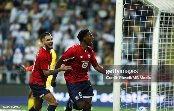 Jonathan David and Remy Cabella of Lille celebrate a goal during the UEFA Europa Conference League play-off second leg between Rijeka and Lille at...