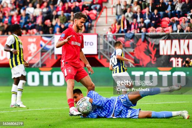 Stadium Grolsch Veste, , season 2023 / 2024 , Conference League Football. Twente player Daan Rots, Fenerbahce goalkeeper Irfan Can Egribayat - Photo...