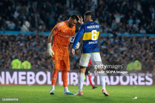 Marcos Rojo and goalkeeper Sergio Romero of Boca Juniors before the penalty shoot out during a second leg quarter final match between Racing Club and...