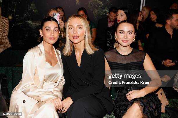 Anna Nooshin, Viky Rader and Anna Idriess during the Marc Cain Fashion Show to celebrate their 50th anniversary at Marc Cain GmbH on August 31, 2023...