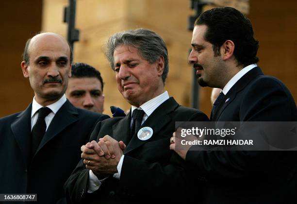 Former Lebanese President Amin Gemayel is comforted by Parliament majority leader Saad Hariri and Samir Geagea, leader of Christian Maronite Lebanese...