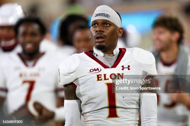 Caleb Curtain of the Elon Phoenix stands on the sideline after scoring a touchdown during a football game against the Wake Forest Demon Deacons at...