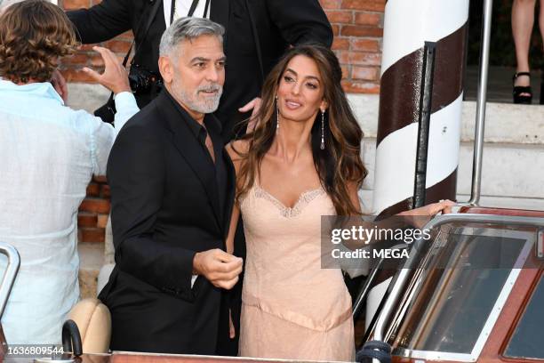 George Clooney and Amal Clooney are seen arriving at the DVF Awards on August 31, 2023 in Venice, Italy.