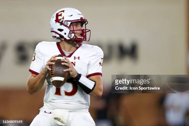 Justin Allen of the Elon Phoenix looks to pass the ball during a football game against the Wake Forest Demon Deacons at Allegacy Federal Credit Union...