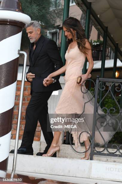 George Clooney and Amal Clooney are seen arriving at the DVF Awards on August 31, 2023 in Venice, Italy.