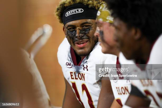 Brandon Tyson of the Elon Phoenix sits on the sidelines during a football game against the Wake Forest Demon Deacons at Allegacy Federal Credit Union...