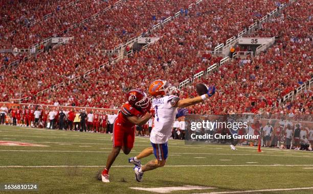 JaTravis Broughton of the Utah Utes breaks up a pass intended for Ricky Pearsall of the Florida Gators during the second half of their game at Rice...