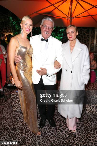 Model Karolina Kurkova, Founder and CEO Helmut Schlotterer and Diane Kruger during the Marc Cain 50 years anniversary fashion show event...