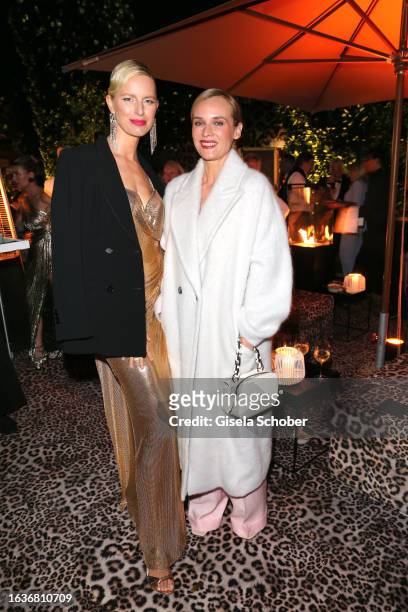 Model Karolina Kurkova and Diane Kruger during the Marc Cain 50 years anniversary fashion show event Sommernachtstraum" at Marc Cain GmbH on August...
