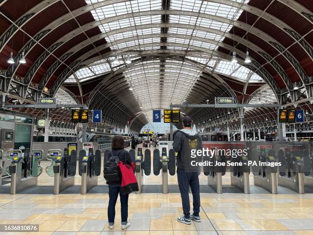 Scenes at Paddington station in London as rail passengers face fresh travel chaos on Friday because of another strike by drivers in the long-running...