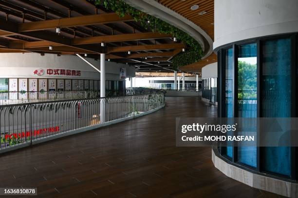 Closed shops are seen inside the Forest City Outlet Mall, a development project launched under China's Belt and Road Initiative in Gelang Patah in...