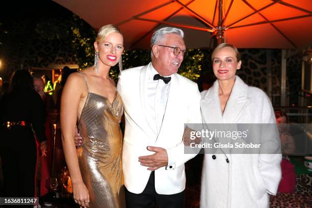 Model Karolina Kurkova, Founder and CEO Helmut Schlotterer and Diane Kruger during the Marc Cain 50 years anniversary fashion show event...