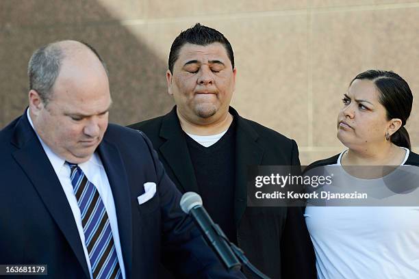 Michael Duran , who received nearly $1 million in a sex abuse settlement with the Roman Catholic Archdiocese of Los Angeles, reacts during a news...