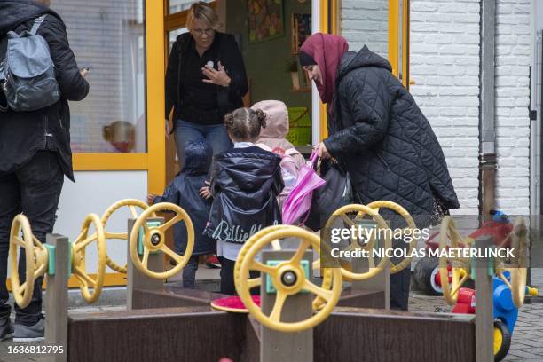 Illustration shows pupils arriving for the first day of school at the Go! Basisschool Klim-Op in Vilvoorde, on the first day of school for the...