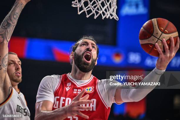 Georgia's Tornike Shengelia drives to the basket during the FIBA Basketball World Cup group K match between Germany and Georgia at Okinawa Arena in...