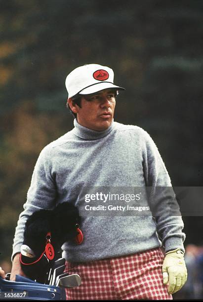 Lee Trevino of the USA contemplates which club to use during the Piccadilly World Matchplay at Wentworth Golf Club in Surrey, England. \ Mandatory...