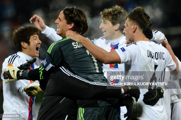 Basel 1893's football players Yann Sommer , Park Joo Ho , Markus Steinhofer and Aleksandar Dragovic react at the end of the UEFA Europe League round...