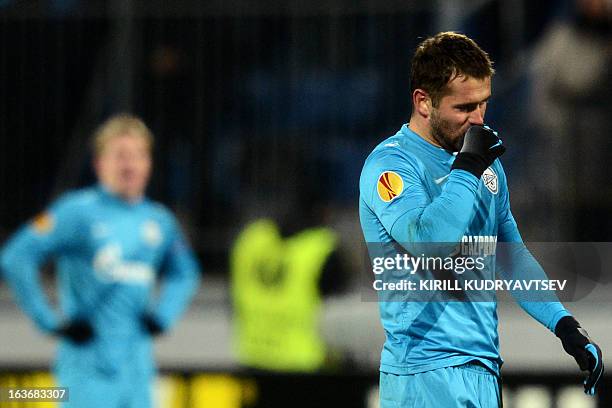 Zenit St. Petersburg's player Aleksandr Kerzhakov reacts at the end of the UEFA Europe League round of 16 football match between FC Zenit St....