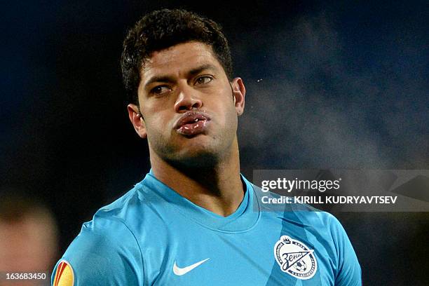 Zenit St. Petersburg's football player Hulk reacts during the UEFA Europe League round of 16 football match between FC Zenit St. Petersburg and FC...