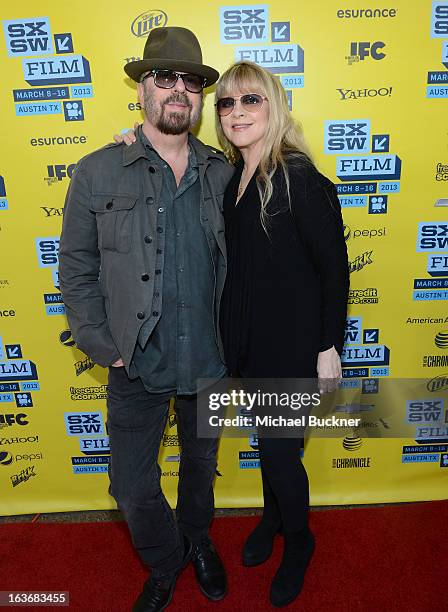 Musicians Dave Stewart and Stevie Nicks arrive at the screening of "In Your Dreams:Stevie Nicks" during the 2013 SXSW Music, Film + Interactive...