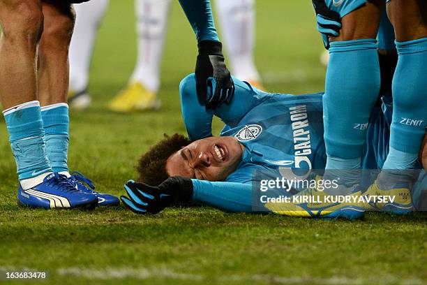 Zenit St. Petersburg's football player Axel Witsel reacts during the UEFA Europe League round of 16 football match between FC Zenit St. Petersburg...