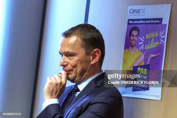 French Labour Minister Olivier Dussopt visits the Caisse d'assurance retraite et de la santé au travail or the occupational health and pension...