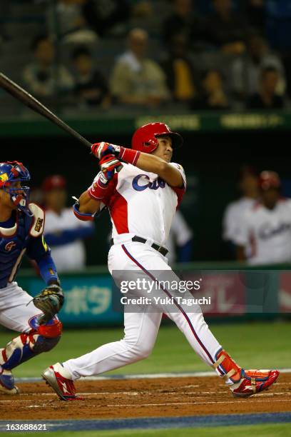 Frederich Cepeda of Team Cuba hits a two run home run in the bottom of the first inning during Pool 1, Game 3 between the Chinese Taipei and Cuba in...