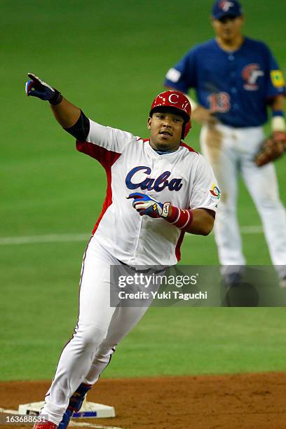 Yasmany Tomas of Team Cuba runs the bases after hitting a three run home run in the bottom of the fourth inning during Pool 1, Game 3 between the...