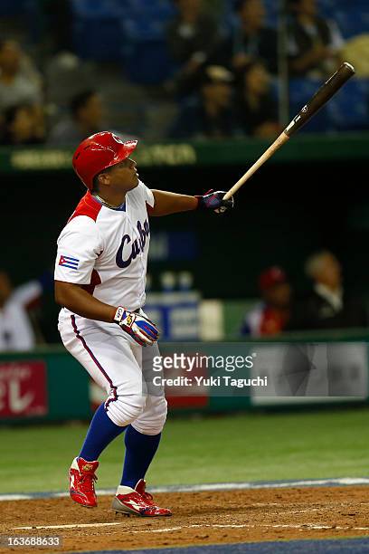 Alfredo Despaigne of Team Cuba hits a solo home run in the bottom of the sixth inning during Pool 1, Game 3 between the Chinese Taipei and Cuba in...