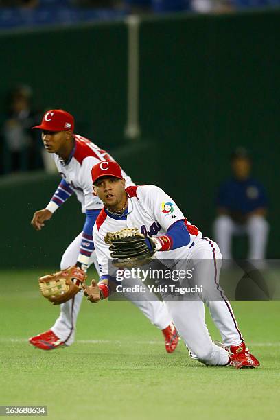 Yulieski Gurriel of Team Cuba makes a sliding catch during Pool 1, Game 3 between the Chinese Taipei and Cuba in the second round of the 2013 World...