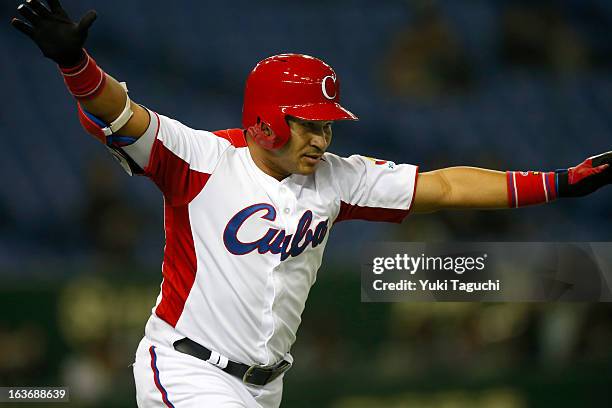 Frederich Cepeda of Team Cuba reacts to hitting a two run home run in the bottom of the first inning during Pool 1, Game 3 between the Chinese Taipei...