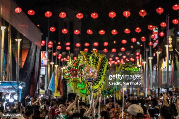 This picture taken on August 31 Dragon dance performance during a parade for Chinese Hungry Ghost Festival in Kuala Lumpur. According to Taoist and...