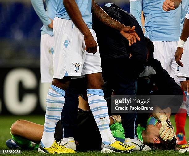 Lazio goalkeeper Federico Marchetti is injured during the UEFA Europa League Round of 16 second leg match between S.S. Lazio and VfB Stuttgart at...