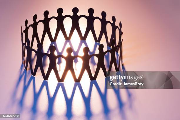 united in ring of brotherhood; network, unity, family, team - paper crown stock pictures, royalty-free photos & images