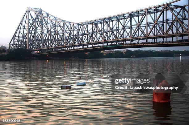 evening prayer - howrah bridge stock pictures, royalty-free photos & images