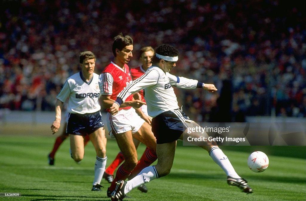 Steve Foster of Luton and Alan Smith of Arsenal