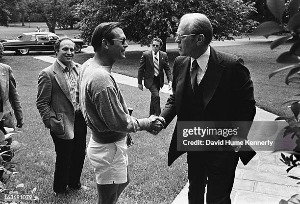 Vice President Dick Cheney photographed from 1975 to 2006 in Washington, DC. Donald Rumsfeld in shorts shaking President Ford's hand as Dick Cheney...