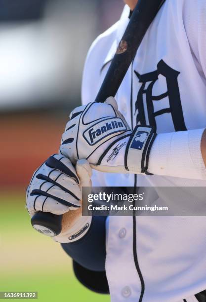 Detailed view of the Franklin batting gloves worn by Zach McKinstry of the Detroit Tigers as he waits on-deck to bat during the game against the New...