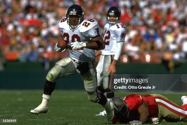 ATLANTA FALCONS RUNNING BACK TONY SMITH CARRIES THE FOOTBALL DURING THE FALCONS 56-17 LOSS TO THE SAN FRANCISCO 49ERS AT CANDLESTICK PARK IN SAN...