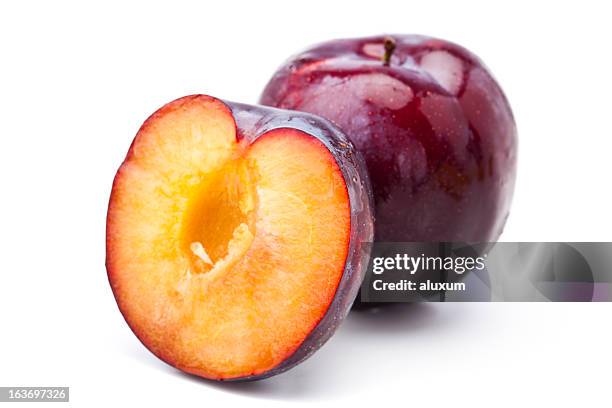 red plums - plum stock pictures, royalty-free photos & images