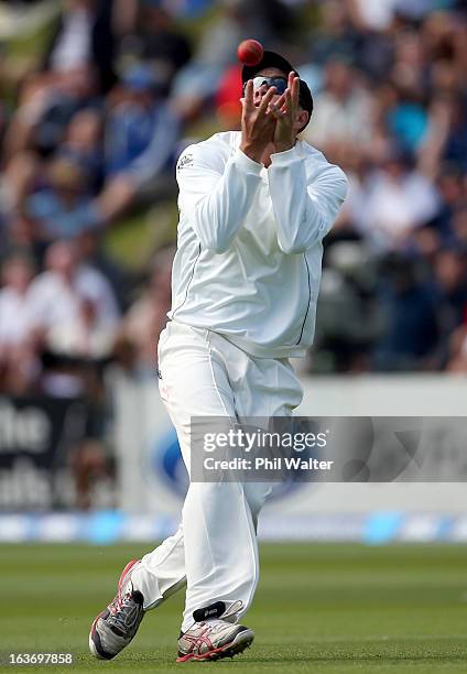 Peter Fulton of New Zealand catches out Ian Bell of England during day two of the second Test match between New Zealand and England at Basin Reserve...