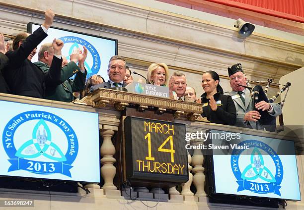 Alfred E. Smith IV , Grand Marshal of the 252nd St. Patrick's Day Parade, joined by Parade Committee members rings the closing bell in honor of St....