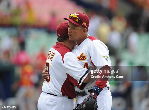 Miguel Cabrera of Team Venezuela hugs manager Luis Sojo after defeating Team Spain in Pool C, Game 5 in the first round of the 2013 World Baseball...