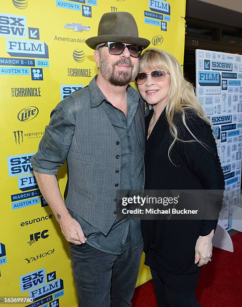 Musicians Dave Stewart and Stevie Nicks arrive at the screening of "In Your Dreams:Stevie Nicks" during the 2013 SXSW Music, Film + Interactive...