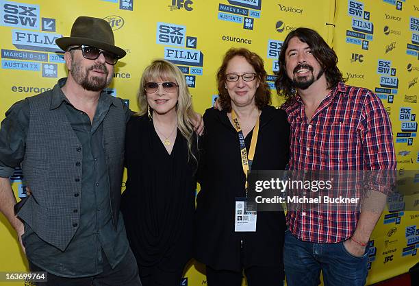 Musicians Dave Stewart, Stevie Nicks, Janet Pierson, Producer SXSW and Dave Grohl arrive at the screening of "In Your Dreams:Stevie Nicks" during the...